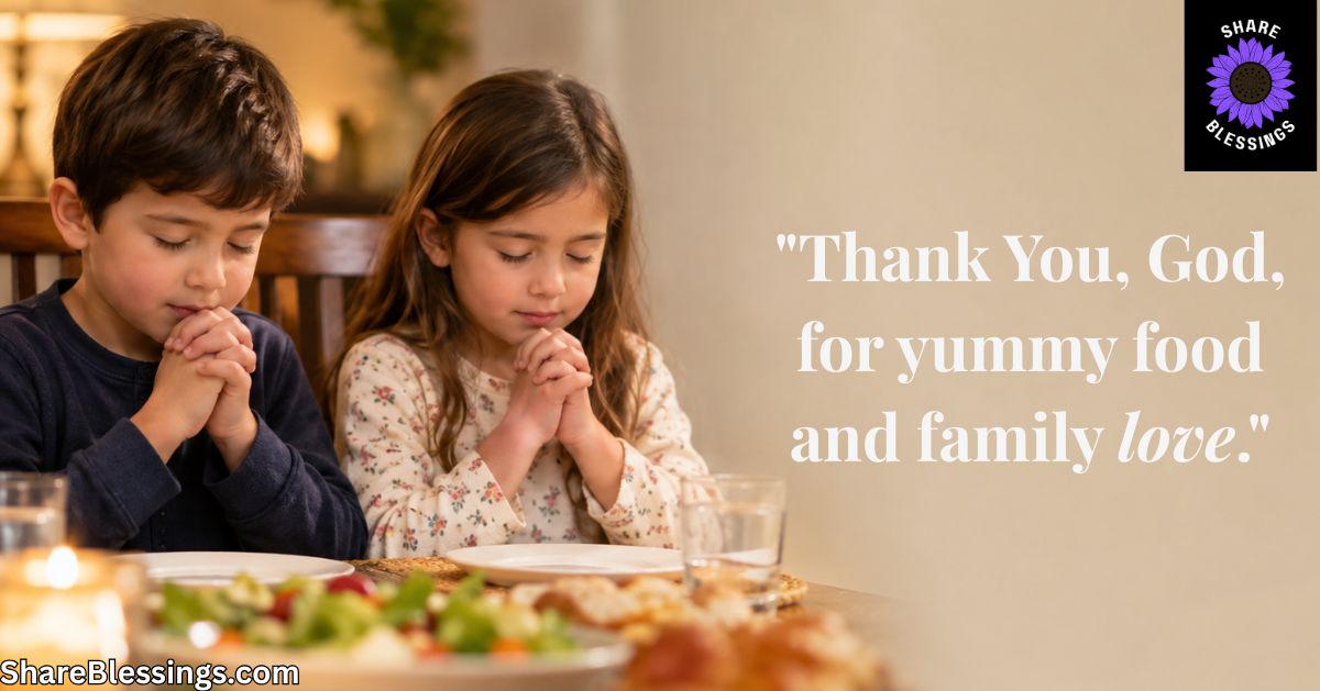 Two young children with hands folded in prayer before a meal