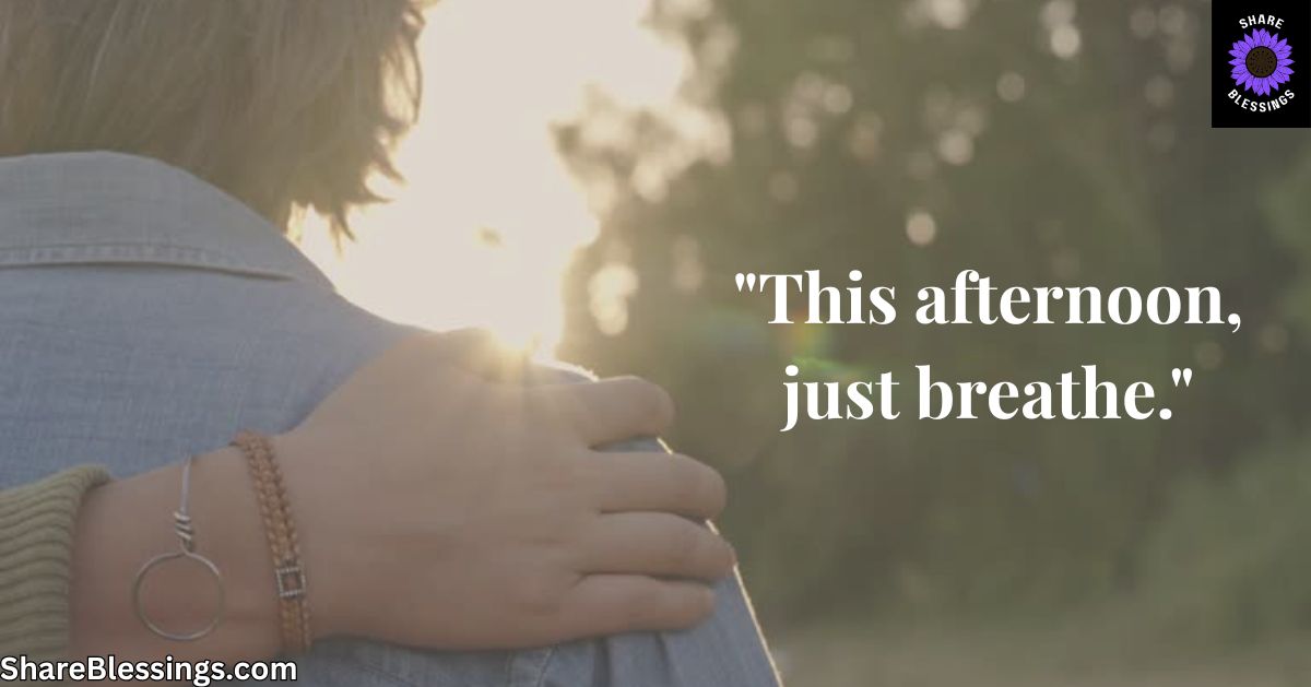 Hand resting gently on shoulder in golden afternoon light