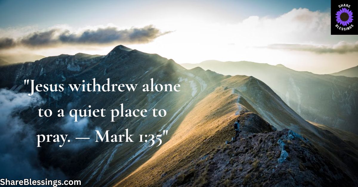 Hiker walking alone along a mountain ridge at sunrise